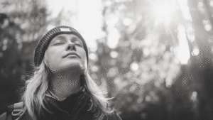 a female is taking breath