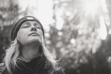 a female is taking breath