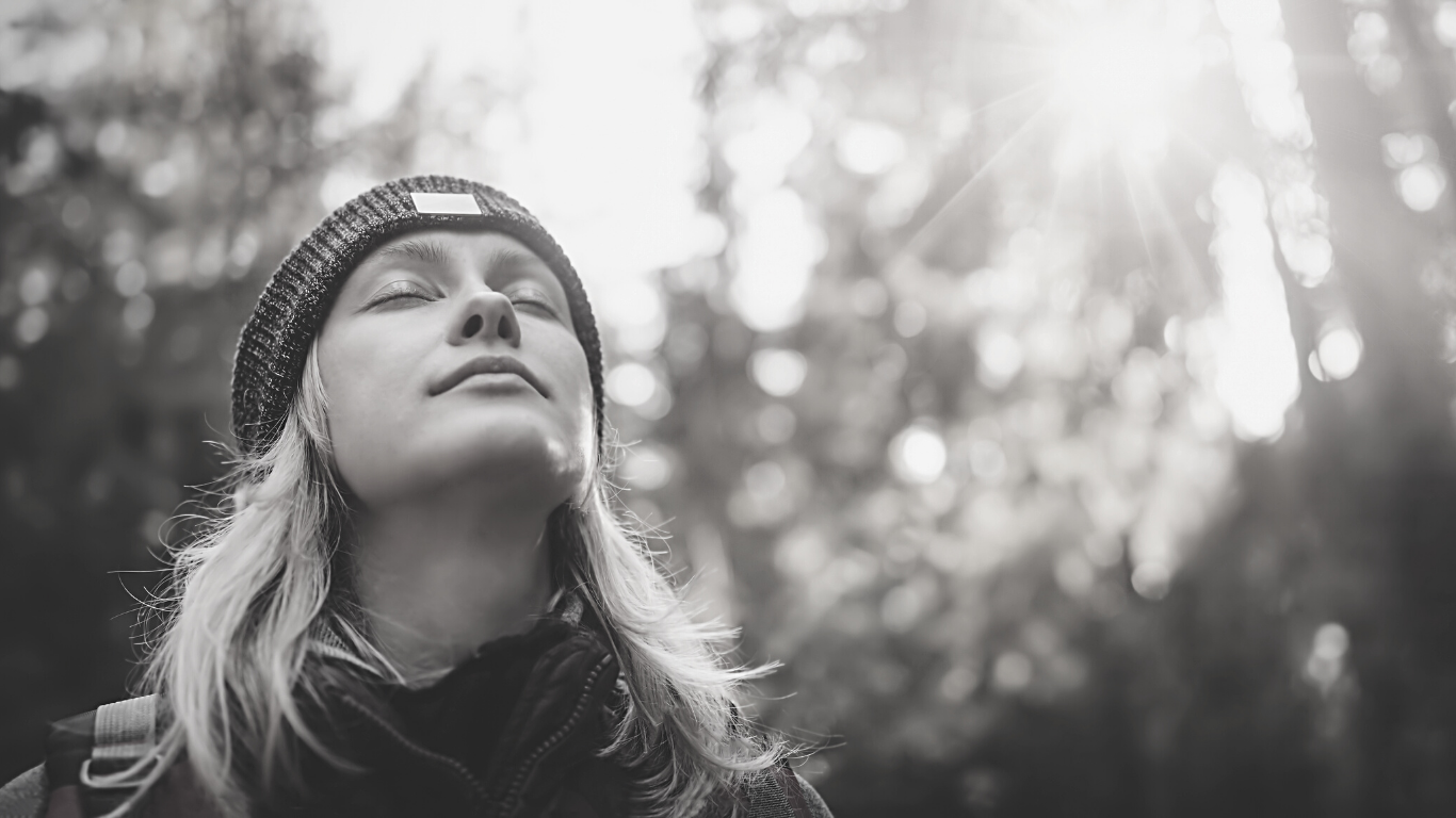 a female is taking breath